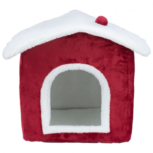 Trixie Xmas Höhle Nevio in Häuschenform aus Polyester-Plüsch mit weihnachtlichem Design.